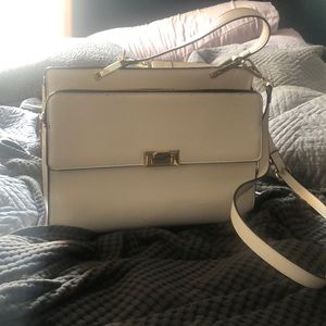 White cross Body